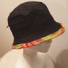 1.1Bob coton finition Madras avec petite poche profil droit. Zippées. Prix : 15.00€.