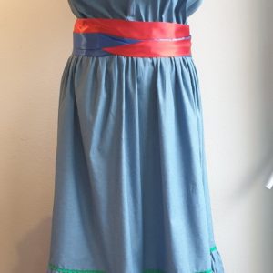 12.1 Robe carabela en tenue traditionnelle haïtienne. Élastique à la taille et une grande ceinture bicolore. Création Anjero Paris. L XL 169.95€