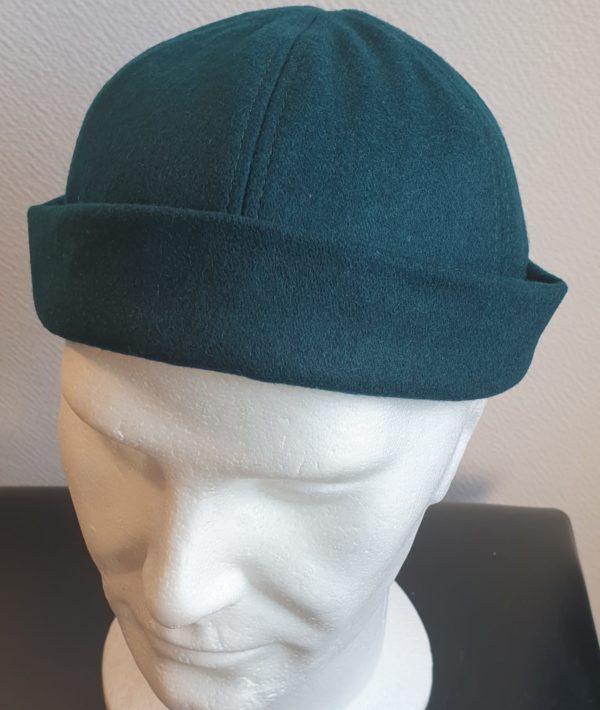 Docker bonnet en laine. Couleur bleu canard. Réglable. Taille unique. Fabrication française.