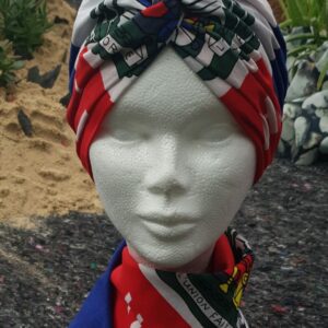 127.1Ensemble bandeau foulard bandana d'un attrait tout à fait particulier de par sa variété de couleurs. Son utilisation polyvalente vous offre aussi un tissu tout en coton et très agréable au porté. Création Anjero. Confectionné entièrement à Paris par Anjero.
