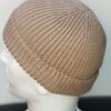 Bonnet d'hivers beige extensible, ajustable et convenant à tous les tours de tête. Ce produit trouve son originalité par une grande douceur et légèreté ressenties dés son porté. Son type de textile se compose pour 49,4% de viscose, 32% de polyester et 18,6% de nylon. Nettoyage 30 degrés maximum. Prix 12€