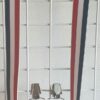 3.3Bretelle sur un motif tricolore hexagonal.