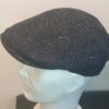 41.2 Béret en chevron laine mélangée entièrement doublé en bleu. Fait en Italie.