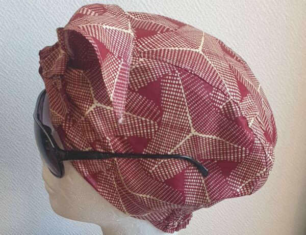 5.2Turban pleine tête en coton wax alliant les couleurs rose framboise et rose dragée. Ce couvre-chef apparenté tout à fait original dispose d'une parfaite élasticité à l'arrière pour une adaptation idéale. Ce dernier est entièrement conçu et réalisé aux ateliers AnjeroCréation  à Paris.