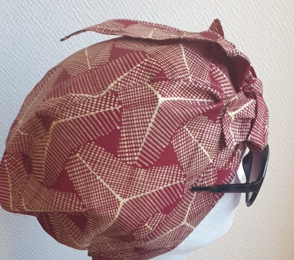 5.3Turban pleine tête en coton wax alliant les couleurs rose framboise et rose dragée. Ce couvre-chef apparenté tout à fait original dispose d'une parfaite élasticité à l'arrière pour une adaptation idéale. Ce dernier est entièrement conçu et réalisé aux ateliers AnjeroCréation à Paris.