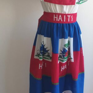 34.1Robe prestige tricolore drapeau Haïti. Tissu 100% coton. Longueur de jupe environ 110cm. Elastique à la taille. Présentation, grande ceinture Haïti à nouer.  Taille : S, M, L, XL. Entièrement conçue et réalisée aux ateliers d'excellence, AnjeroCréation à Paris. Prix : 249.95€